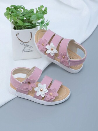 New Classic Three-Color Fashionable Cute Baby Girls Roman Sandals With 3D Six Petals Flower Design, Soft Non-Slip Sole, Easy Hook And Loop Closure, Pre-School Leather Sandals. Note: Slight Difference For The Pattern On The Outer Side Of The Sole Between Size Ranges [21-25 26-29]