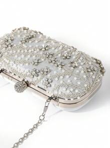 一款优雅浪漫的纯色仿珍珠串珠晚宴包，饰有水钻，结实耐用，可直接作为新娘包使用。完美适用于派对、婚礼、舞会、晚宴/宴会，可搭配婚纱、正式礼服、舞会礼服、生日礼服、派对礼服。这款优雅的仿珍珠手拿包、舞会包、串珠包，是您的理想之选。 - 銀色 - 查看 7