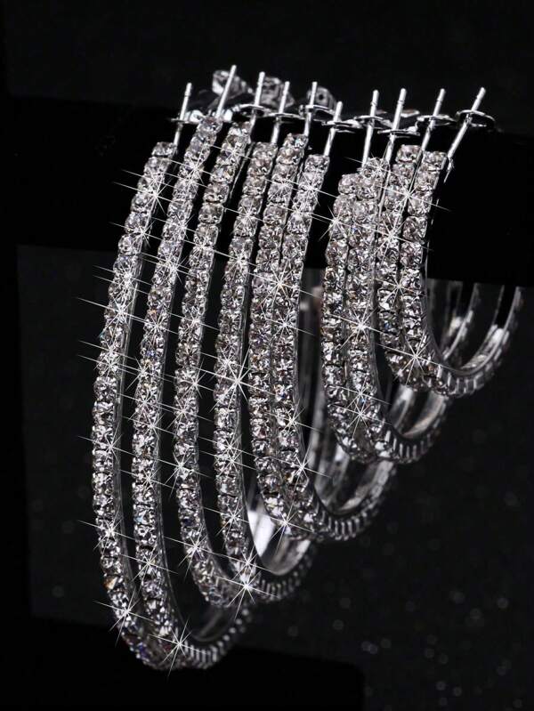 زوج من الأقراط الغريبة الأوروبية والأمريكية مع الراين للرقص الشارعي والعرائس من أحجام مختلفة