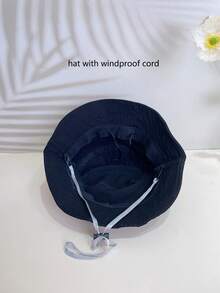 A Black Color Unisex Middle-Child Children Bucket Hat, Suitable For All Seasons, Made Of Lightweight All-Season Fabric Material. The Hat Is A Wide-Brimmed Summer Sun Ion Children Bucket Hat That Can Also Be Worn In Other Seasons.