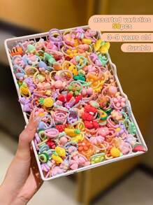 1 paquete de 50 piezas de Lazos de cabello en espirales de dibujos animados coloridos lindos al azar - Multicolor - Ver 6