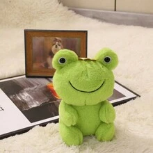 Un juguete de peluche lindo de una rana con corona sonriente de 10 pulgadas - Verde - Ver 1