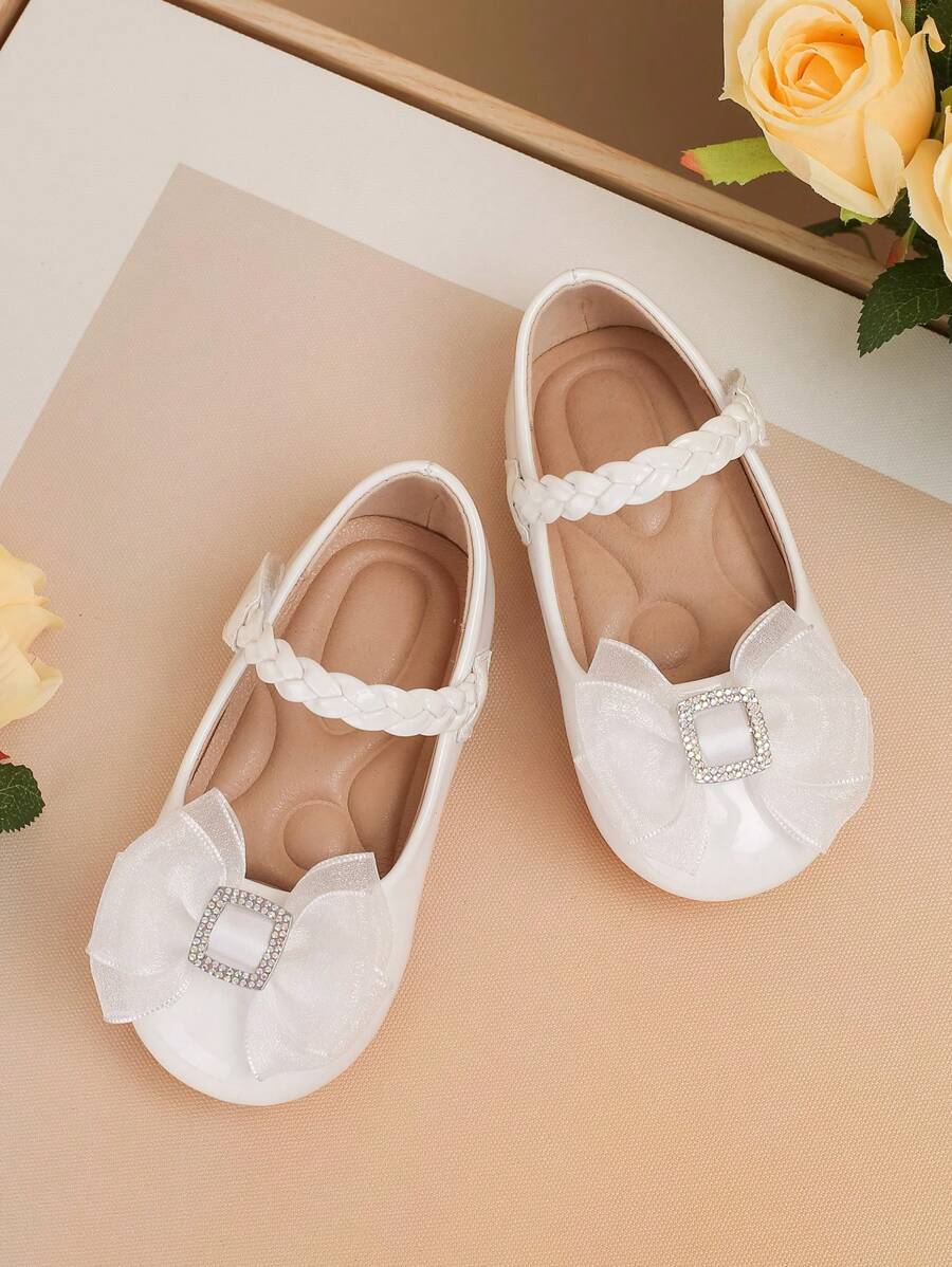 1 par de lindos zapatos planos para bebé con lazo de strass, correa trenzada, unicolor, antideslizantes, para caminar al aire libre, adecuados para primavera y otoño - Blanco - Ver 1