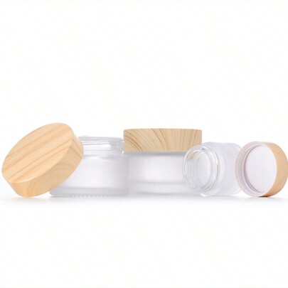 زجاجة زجاجية محفورة 10 جم / 15 جم / 20 جم / 30 جم / 50 جم لرعاية البشرة حول العين ، يمكن استخدامها كعبوة بديلة مع غطاء خشبي ذو حبيبات خشبية ، تزيين منزل غرفة المعيشة وغرفة النوم والحمام للأسفلت السفر لكريم الوجه وكريم العين واللوشن وزجاجة تغليف التجميل