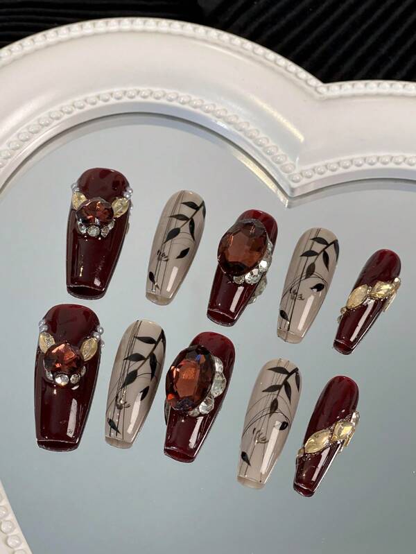 10 pièces Ongles Faux de couleur rouge avec élégantes lignes peintes à la main et des strass, convient pour les mariées, les mariages, les fêtes ou pour un port quotidien