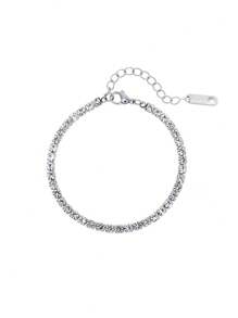 Un braccialetto da donna in acciaio titanio argentato completamente adornato con micro pietre cubic zirconia a pavé