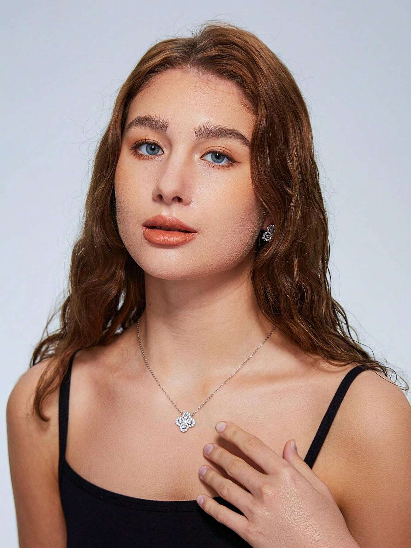 A Set Of Silver Lucky Clover Necklace And Earrings For Women As Holiday