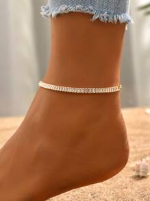An Exquisite Metal Textured Rectangular Anklet With Rice Grain Pattern, Suitable For Women To Wear On Vacation, Date Or Daily - Yellow Gold - View 1