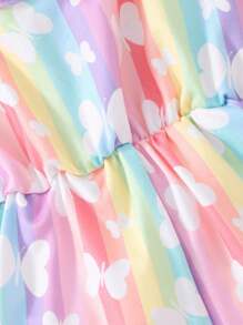 年輕女孩蝴蝶印花交叉背帶連身褲，帶有飄逸袖子和開放式背部設計