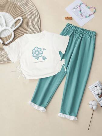 OIPOIG 夏季少女短袖T恤和長褲套裝，上半身印有字母和花卉圖案，側面褶皺和蝴蝶結胸針裝飾，採用舒適面料製作，簡單，時尚，清新的風格。