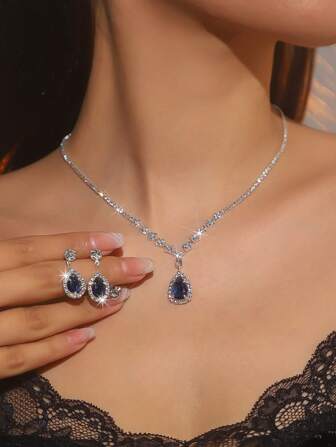 Conjunto de joyas de collar y pendientes vintage con colgante de lágrima azul brillante, accesorios lujosos de vestido de novia ideal para fiestas y eventos.