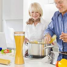 A Large Plastic Food Storage Container With A Sealed Wooden Lid, Used For Storing Pasta, Nuts, Flour. Ideal For Kitchen Organization And Storage In A Pantry With Glass Jars.