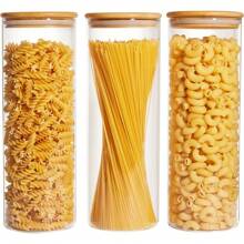 A Large Plastic Food Storage Container With A Sealed Wooden Lid, Used For Storing Pasta, Nuts, Flour. Ideal For Kitchen Organization And Storage In A Pantry With Glass Jars.