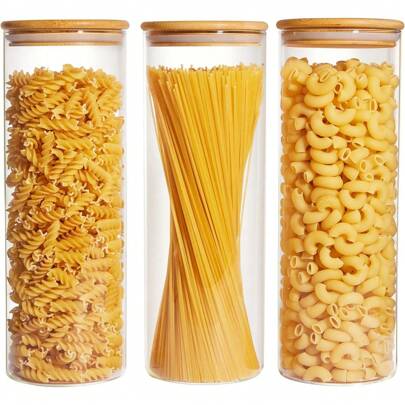A Large Plastic Food Storage Container With A Sealed Wooden Lid, Used For Storing Pasta, Nuts, Flour. Ideal For Kitchen Organization And Storage In A Pantry With Glass Jars.