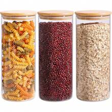 A Large Plastic Food Storage Container With A Sealed Wooden Lid, Used For Storing Pasta, Nuts, Flour. Ideal For Kitchen Organization And Storage In A Pantry With Glass Jars.