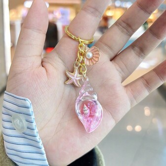 Självlysande snäckskalnyckelring med oljedropp, sjöstjärna och fiskstjärthänge, sommarsemesterstil, nyckelring för väska, dekoration för biltillbehör, väskberlock för skola, söta goth-accessoarer för Y2K, Halloween-accessoarer för lärare, julklappsidéer, väsknyckelband med ID-hållare, biltillbehör, väskberlocker