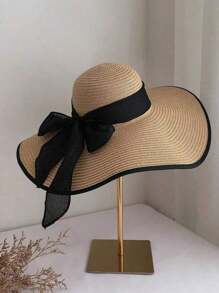 Chapeau de soleil en paille à large bord pour femmes avec protection UV pour les vacances à la plage, pliable et élégant