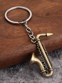 1 pieza Mini instrumento musical saxofón de metal en estilo bohemio y dopamina, llavero colgante, regalo musical para amigos, padres, niños, accesorios de coche, bolso, escuela, estilo gótico y Y2K, disponible al por mayor