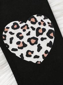 Giovane ragazza primavera/estate top casual a maniche corte con stampa leopardo e leggings