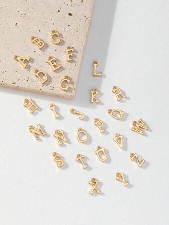 26 piezas / set de kit de fabricación de joyas DIY con 26 letras para hacer pulseras, collares y encantos de aretes