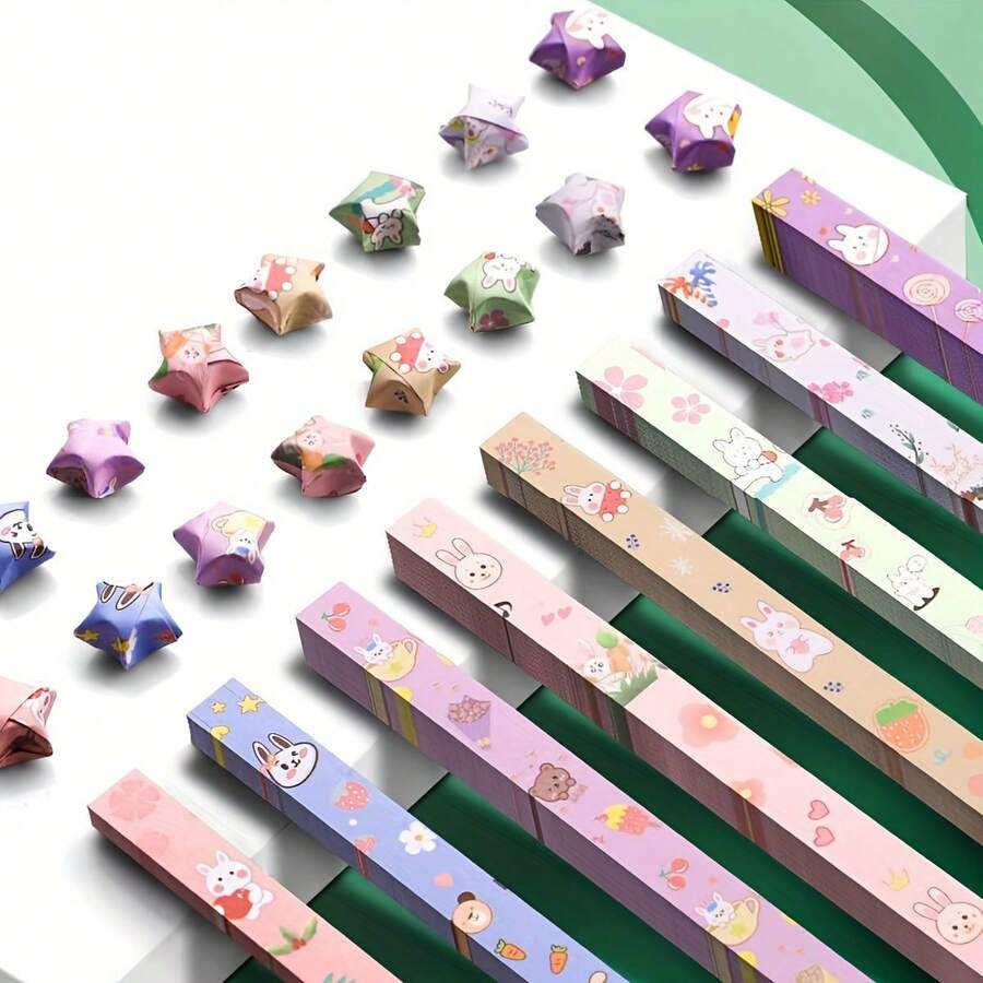 540 Hojas de papel de origami de estrella de la suerte con diseño de conejo de dibujos animados para doblado de papel DIY. Papel especial para doblado de estrella de 5 puntas. Regalo pequeño (color aleatorio de partes)