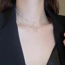 精致吊坠高端露背女士项链配饰，清新甜美胸链配个性流苏和水钻吊坠，性感女士钛钢身体链锁骨链