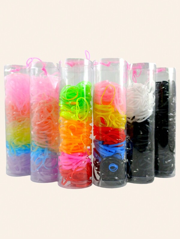 Set de 12 tubos de 100 ligas elásticas grandes  en colores surtidos. Desechables y adecuadas para el uso diario.