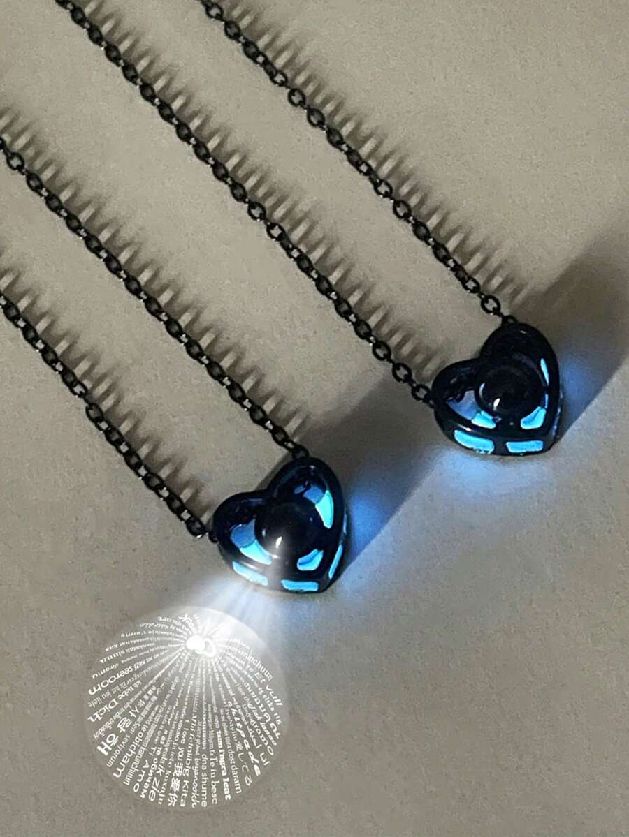 ATLVXJL Set de 2 piezas de joyería a juego con collar de cadena de acero inoxidable con corazón hueco que brilla en la oscuridad y cuentas de proyección, para parejas, regalo del Día de San Valentín - Negro - Ver 1