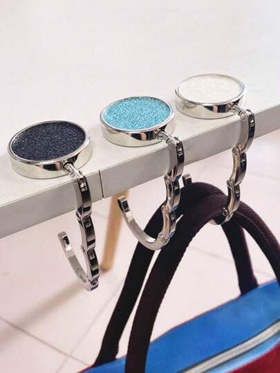 1 Stück Faltbarer Schreibtischhaken (zufällige Farbe).