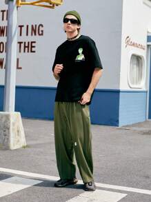 INFLATION Camiseta de hombros caídos con estampado de slogan - Negro - Ver 2