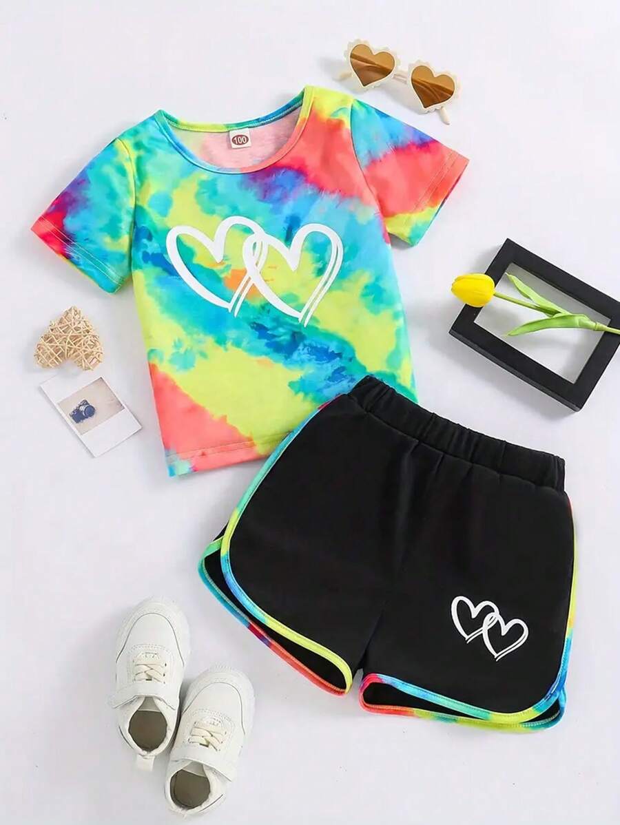 Conjunto de camiseta de manga corta con estampado de corazón y shorts para niñas jóvenes, adecuado para edades de 3 a 7 años