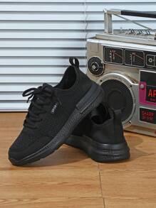 黑色男女款低幫舒適透氣步行鞋，適合青少年、戶外運動和日常穿著