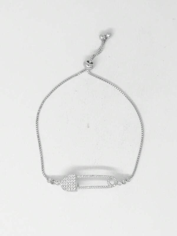 Pulseira com Pingente de Alfinete de Segurança Cravejado em Micro Zircônia Branca