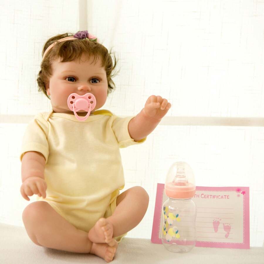 1個18英寸時尚玩具娃娃矽膠再造娃娃，中性柔軟，純手繪，純手工植髮，做工精細，可清洗，附贈奶瓶、奶嘴和出生證明文件 - 黃色 - 查看 1