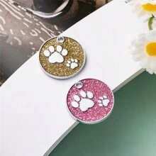 1pc klein formaat gepersonaliseerde huisdier-ID-tag met roze en zilverkleurige hondenpoot rond printontwerp. De achterkant van de tag kan worden aangepast met de naam van het huisdier, contactgegevens, adres, enz. Deze gegraveerde en anti-verloren huisdier-ID-tag is geschikt voor kleine honden en katten