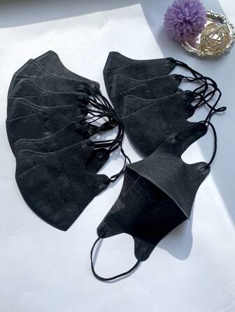 10 piezas Máscaras desechables sólidas 3D para adultos en color negro, de tela no tejida para polvo, protector solar. Tamaño único para la mayoría de los adultos (S-M)