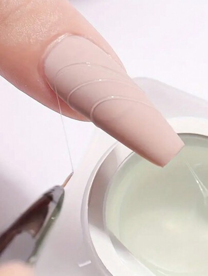 Semi-Solid Spider Gel For Nail Art, 1 Piece. Crafted From ABS Material In An 8g White Square Plastic Bottle, This Unique Semi-Solid Formula Facilitates Precise Control, Making It Easy For Users To Create Intricate And Sophisticated Nail Designs. The Meticulously Designed Bottle Mouth Prevents Spills, Maintaining A Tidy Workspace.  Ideal For Various Nail Art Designs, Including Lines, Patterns, And Three-Dimensional Effects, Catering To Diverse Personalized Preferences. The Lightweight Product Design, Packaged In A Convenient Single Unit, Is Perfect For On-The-Go Individuals, Allowing Them To Maintain Flawless Nails Anytime, Anywhere.  Suitable For Personal DIY Nail Care At Home, As Well As For Use In Professional Settings Such As Nail Art Studios And Salons. It Also Makes A Thoughtful Gift For Girls Who Appreciate The Art Of Nail Design.