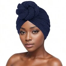 Turbanti da donna in tessuto africano con fiore fatto a mano, nodo solido di colore, cappello da chemio stile casual ad alta gamma, confortevole e traspirante per l'abbigliamento quotidiano della testa.
