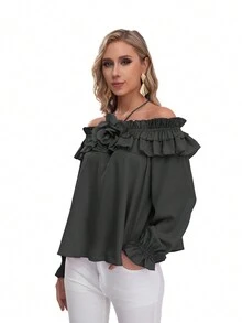 Blusa formal con maga larga, hombros descubiertos con detalle de resorte en la parte de los hombros con olanes  y una flor en el centro - Negro - Ver 3