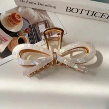 1入組中空蝴蝶形金屬髮爪，適用於女性蝴蝶結