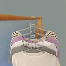 Maximize Your Closet Space With This Multi-Layer Folding Clothes Hanger Hook! Multi-Functional Clothes Hanger, 5-Layer Metal Sponge Clothes Hanger Can Be Disassembled, High-End Magic Anti-Slip Multi-Functional Storage And Organizing Clothes Hanger. (The Product Color May Vary Slightly Due To Photography Reasons.)