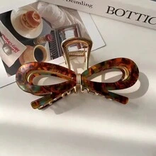 1入組中空蝴蝶形金屬髮爪，適用於女性蝴蝶結