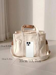 新款时尚大容量多隔层女士手提包，时尚百搭，设计独特，配有可调节可拆卸肩带，适合通勤、外出、购物和收纳。学生托特包采用多层设计，非常适合海滩、学校、工作和日常使用。