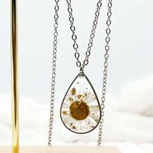 1 Vòng cổ vàng lấy cảm hứng từ thiên nhiên theo phong cách Bohemian với hoa khô thật bằng nhựa, có hoa cúc trắng và hoa cúc trắng, dây chuyền bằng thép không gỉ, một món quà tuyệt vời cho những người yêu thiên nhiên, hoàn hảo để mặc hàng ngày, bạn gái, sinh nhật, ngày của mẹ, giáo viên Ngày, v.v. Hoa Kỳ - dây chuyền hình giọt nước - Xem 15