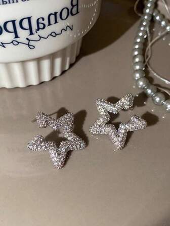 1 paio di orecchini a bottone di lusso con stelle scintillanti per donne