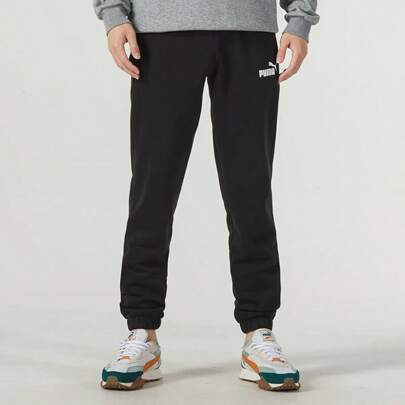 Pantalones de entrenamiento con forro térmico cómodos y casuales de pierna entallada Puma para hombres 678450