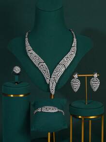4 pièces/set Ensemble de bijoux de luxe pour femmes avec zirconium cubique incrusté micro. Comprend un collier, des boucles d'oreilles, une bague et un bracelet. Parfait pour les occasions formelles, les mariages et comme cadeau pour la Saint-Valentin, la mère, la fête des mères.