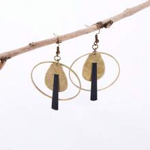 1 paire de boucles d'oreilles à pendentif rond et évidé de style bohémien, plaqué bronze vintage, cadeau de fête unique pour femmes