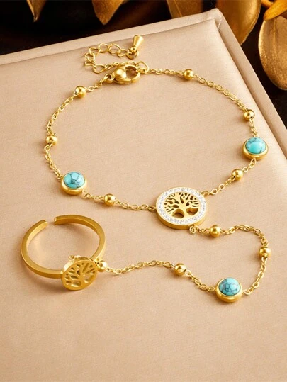 1套採用鍍金不銹鋼鏈扣、設計有綠松石和樹木圖案的手鏈和戒指珠寶套裝