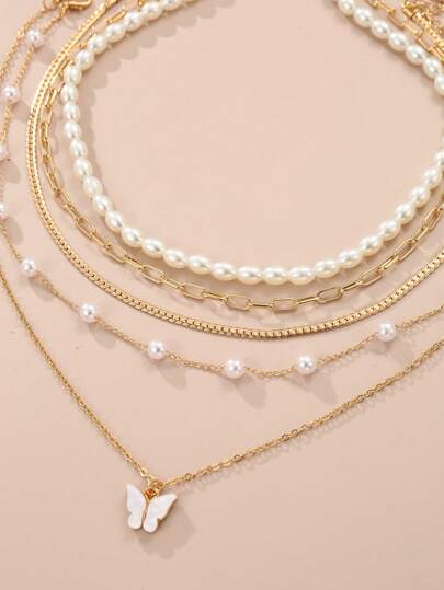Conjunto de 5 colares de corrente de borboleta de pérolas para meninas.